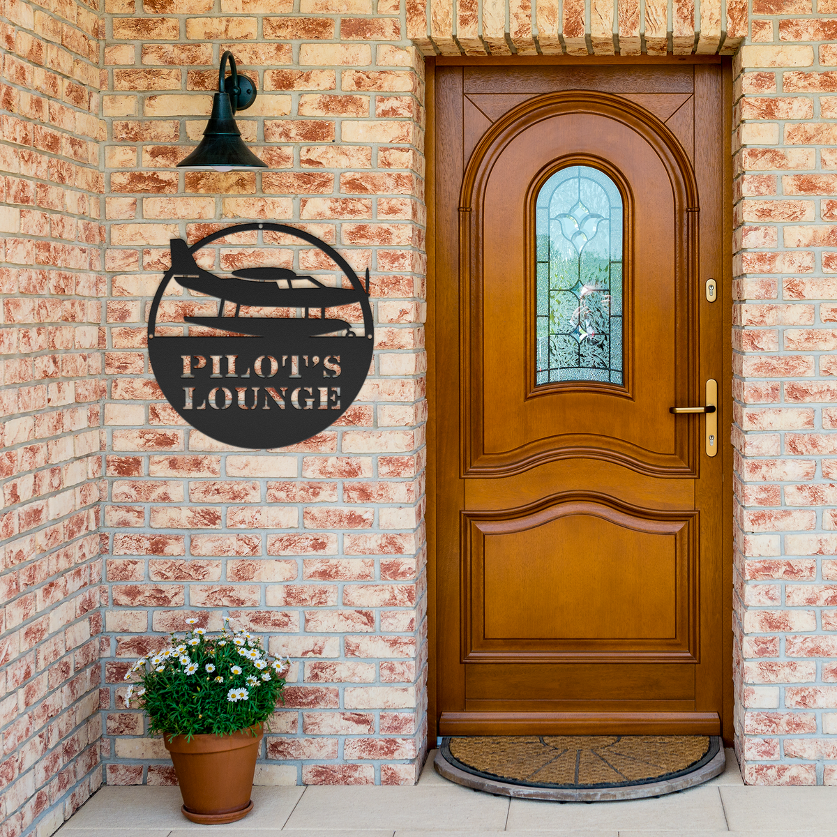 Sea_Plane_Metal_Wall_Art_Black_Brick_Entrance_Mockup.png_15592392